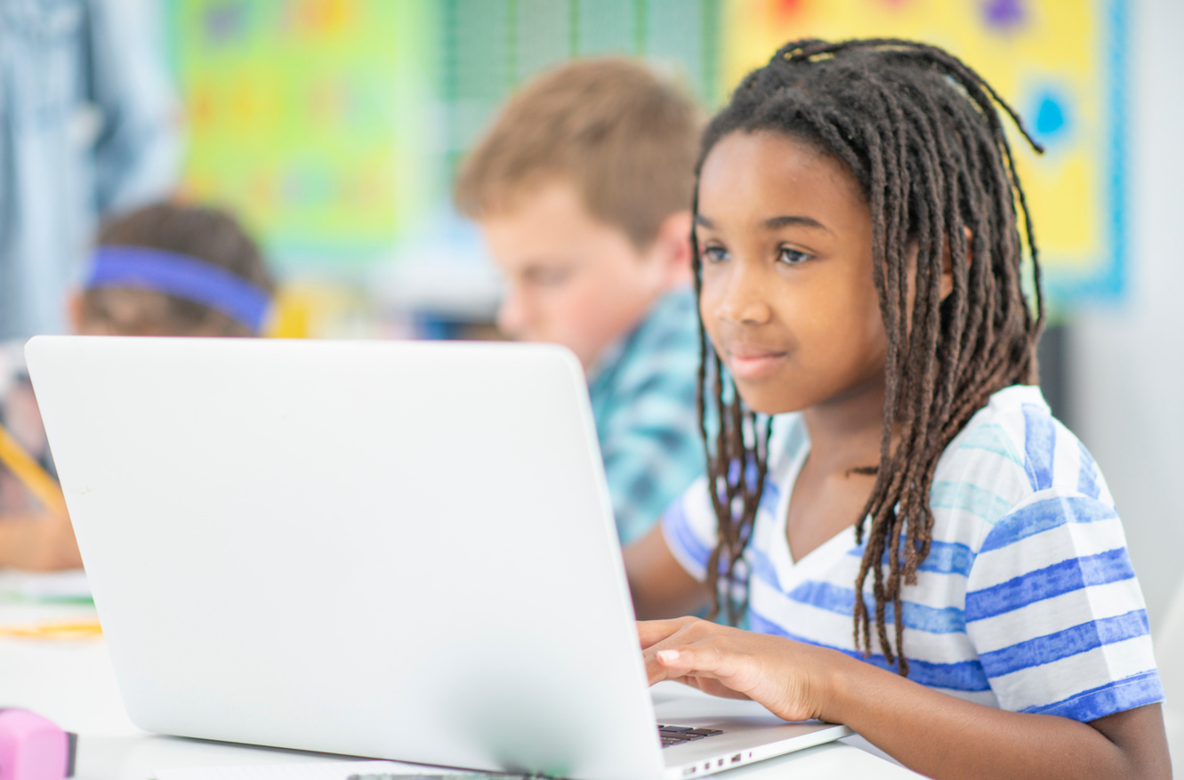 Elementary Student On Computer